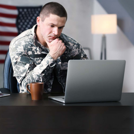 male military personnel on laptop